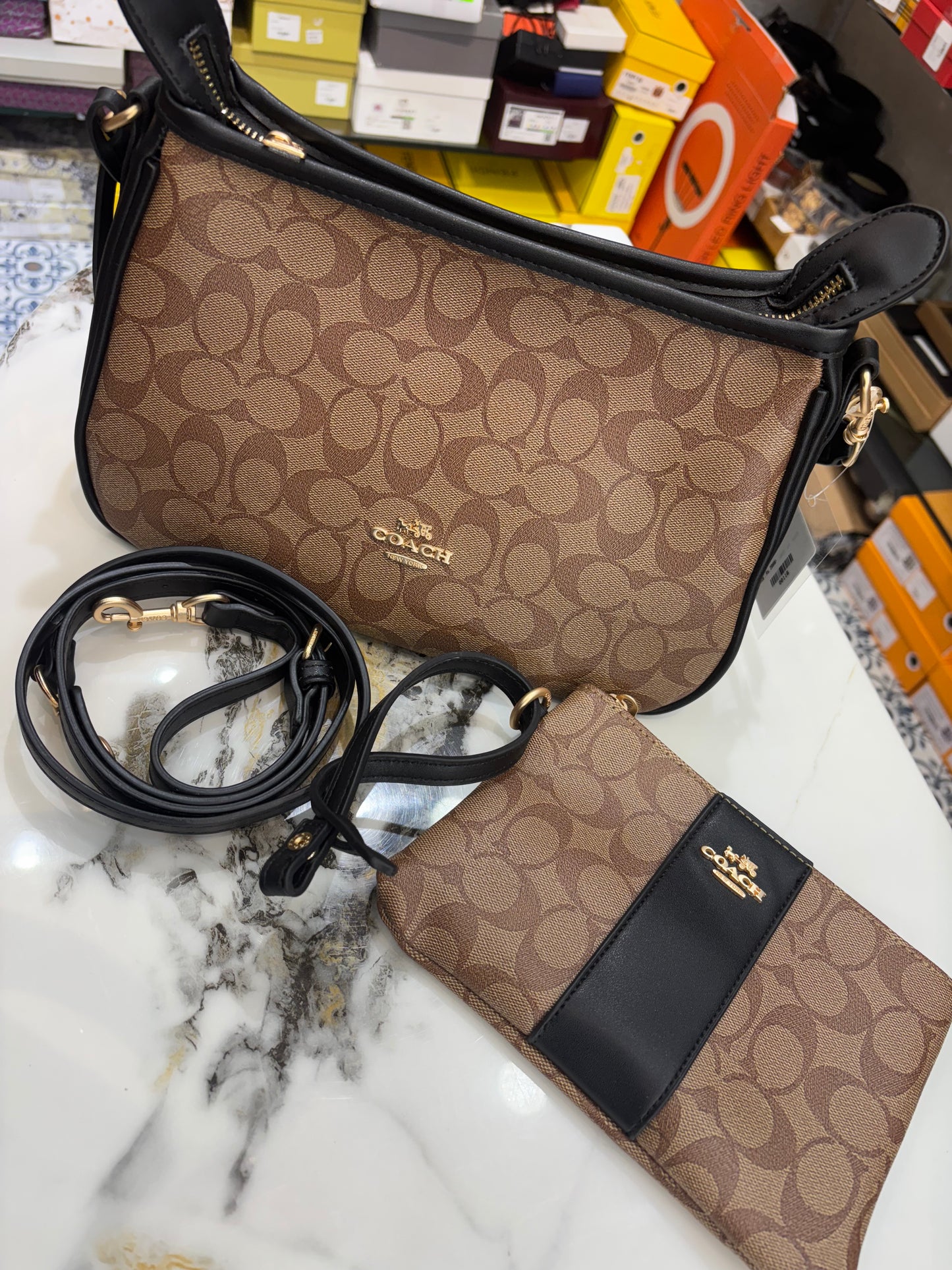 Coach sling with pouch