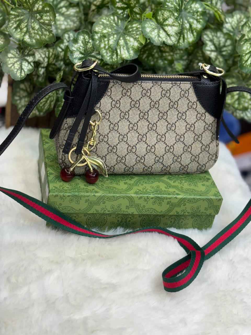 Gucci bag with cherry charm