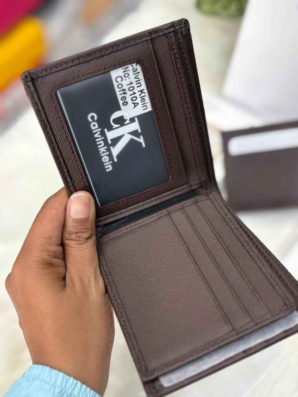 Calvin Klein gift set In genuine leather  ( brown ) includes wallet,card holder and key chain holder next to original quality