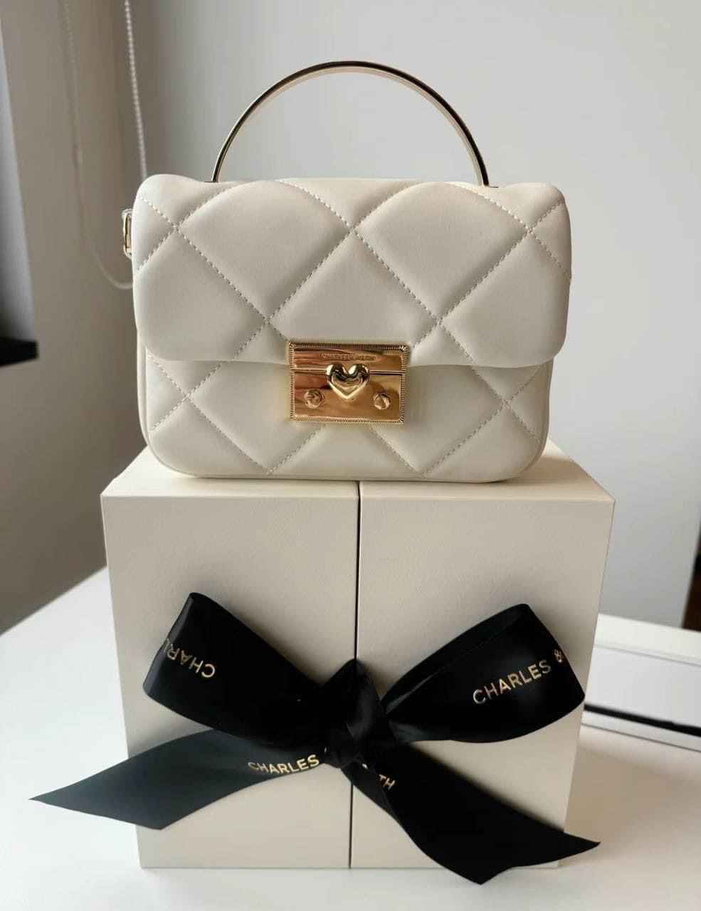 Calvin Klein ck gift box perfect for gifting(ck sling with charms )