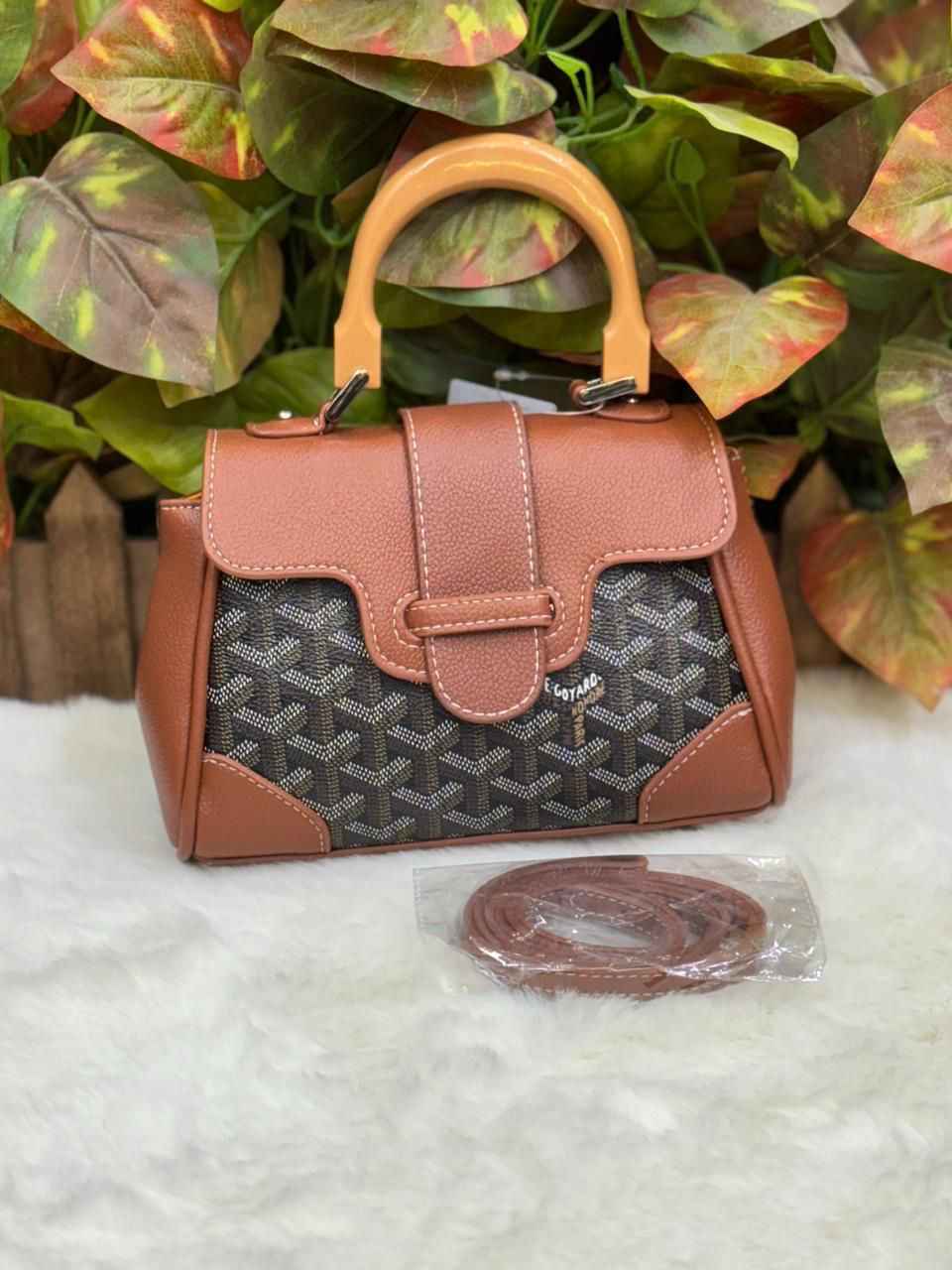 Luxury goyard sling with wooden handle