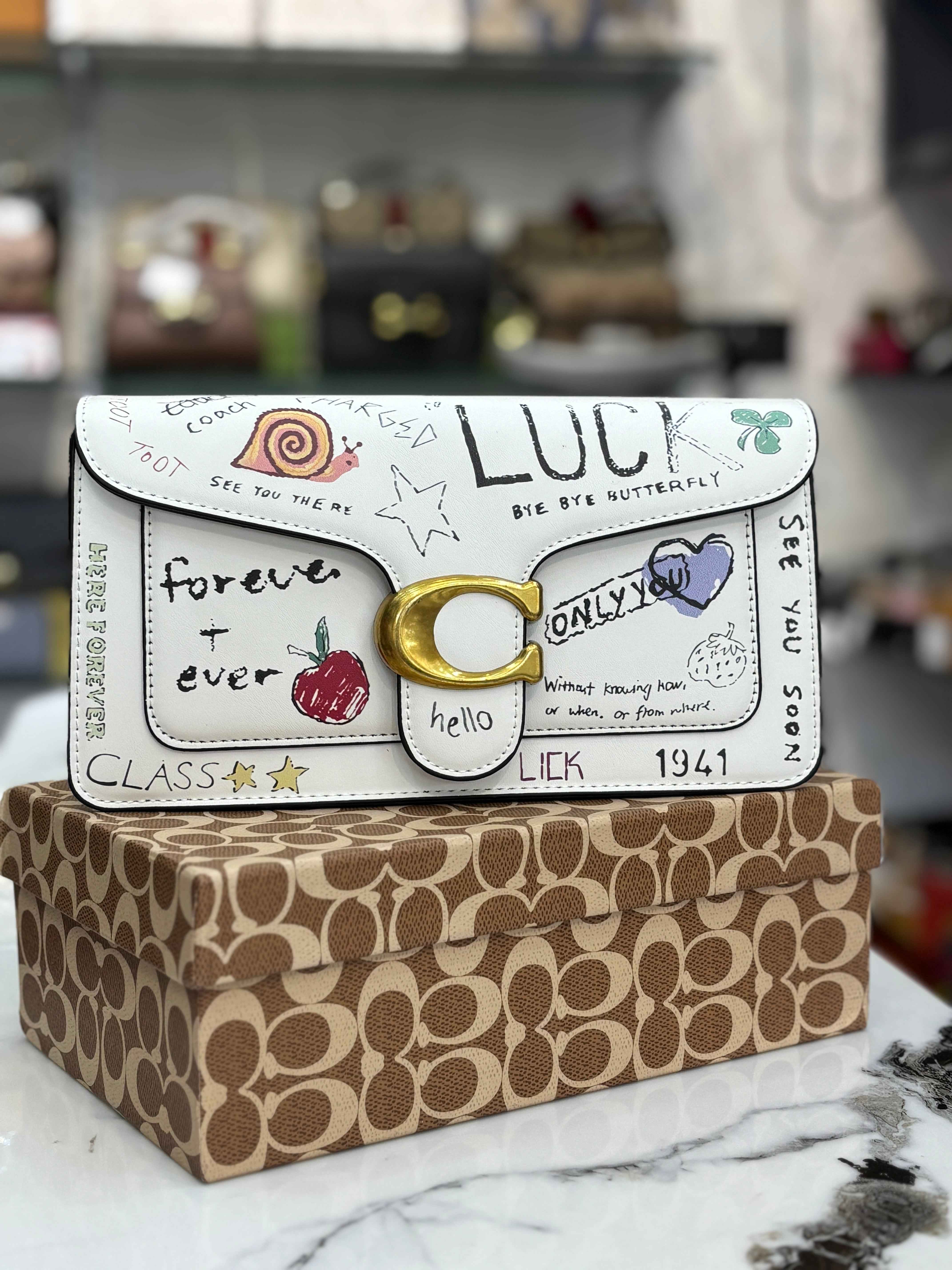 Coach tabby with sketch print