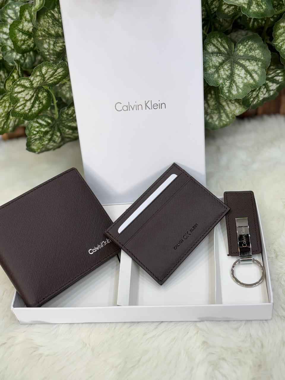 Calvin Klein gift set In genuine leather  ( brown ) includes wallet,card holder and key chain holder next to original quality
