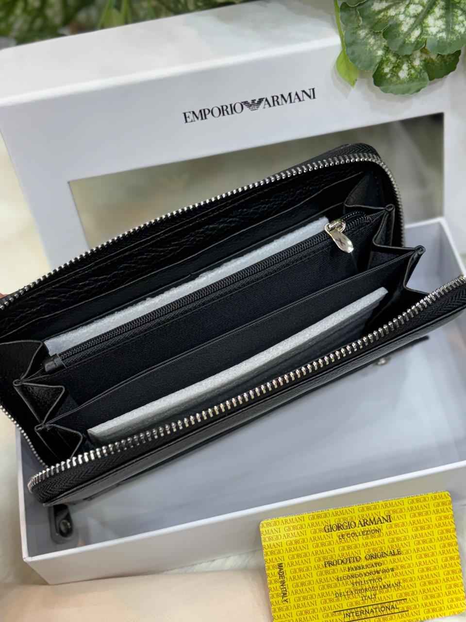 Luxury Armani wallet in genuine leather next to original quality