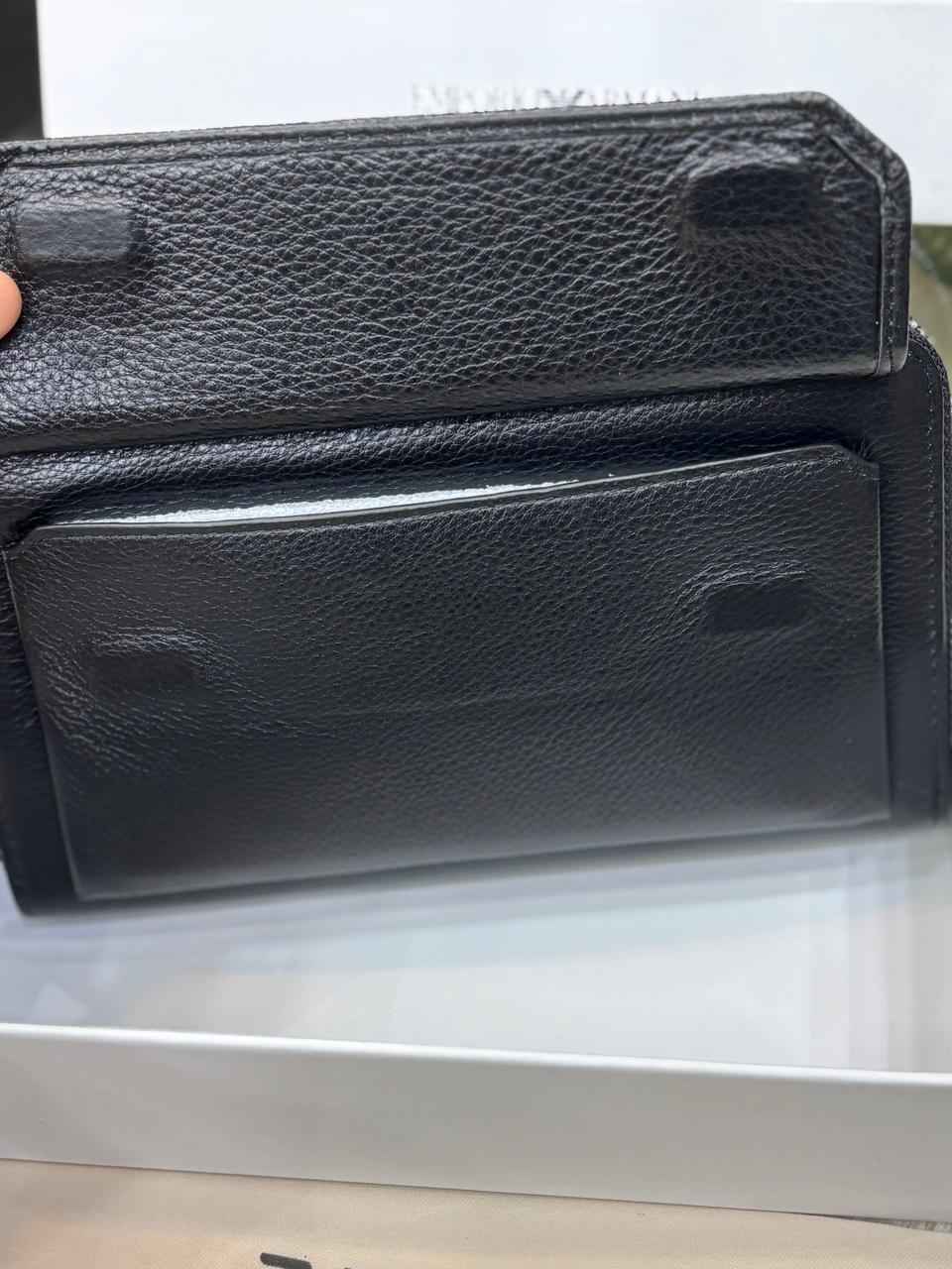 Luxury Armani wallet in genuine leather next to original quality