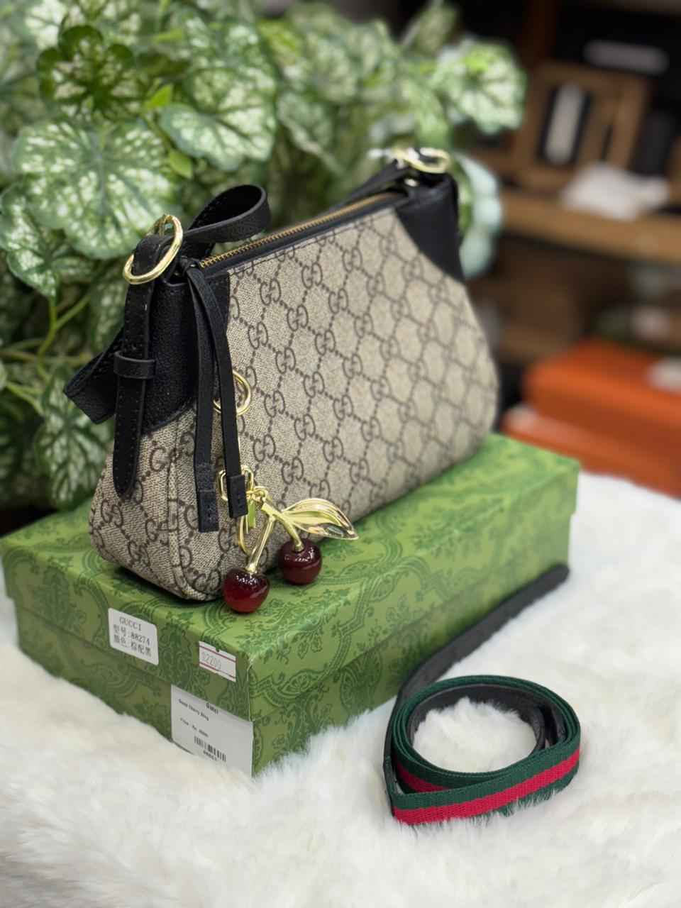 Gucci bag with cherry charm