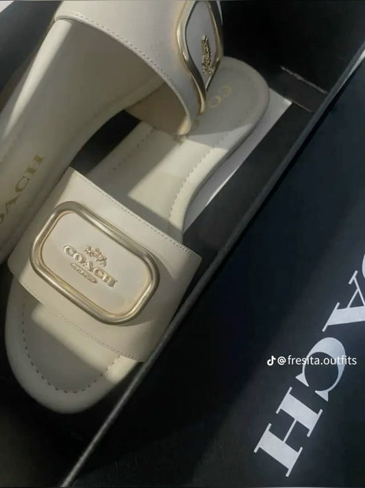 Coach slip on