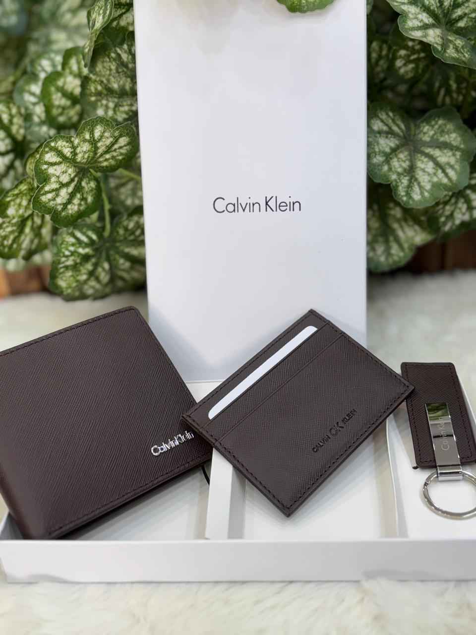 Calvin Klein gift set In genuine leather  ( brown ) includes wallet,card holder and key chain holder next to original quality