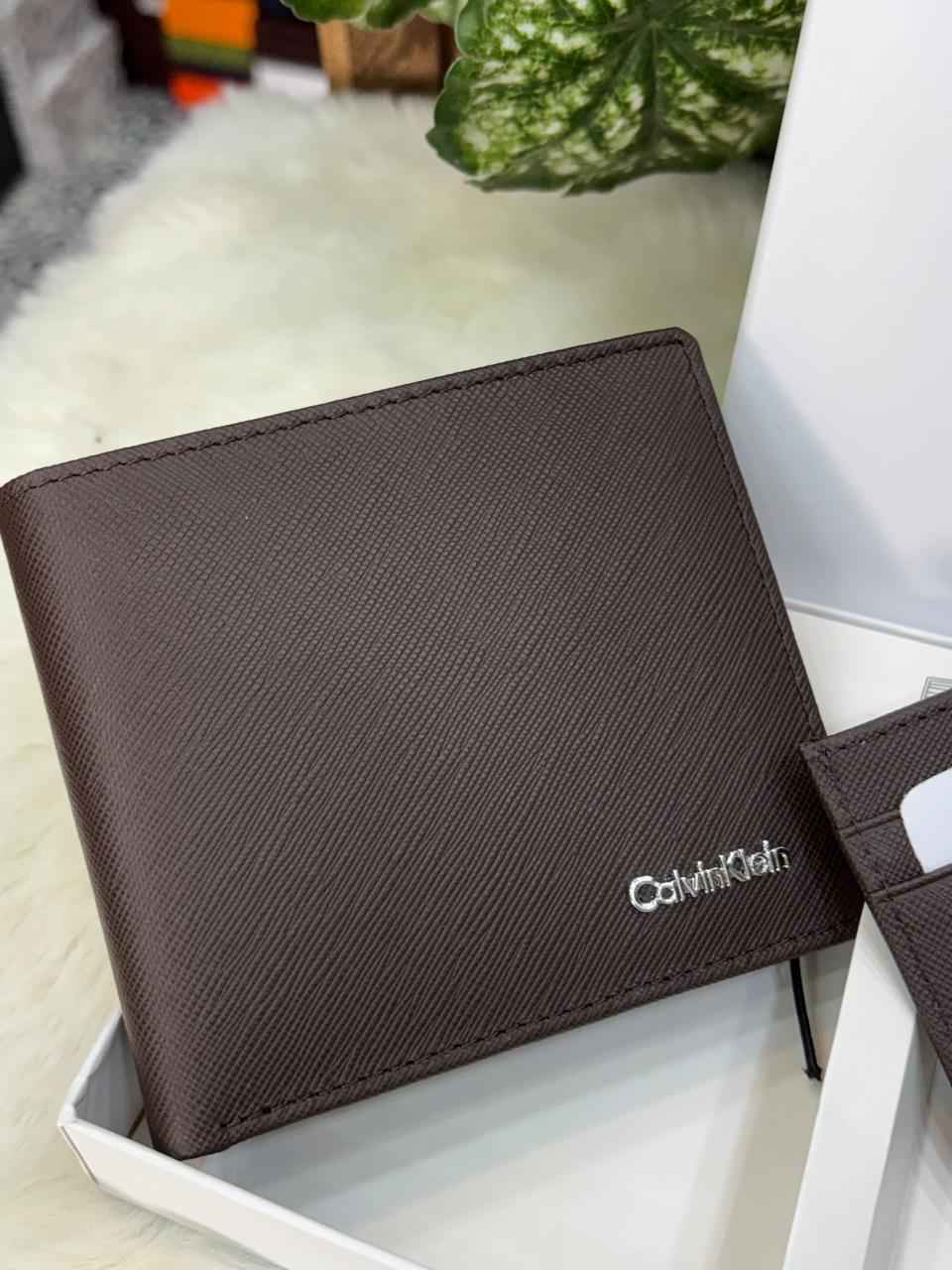 Calvin Klein gift set In genuine leather  ( brown ) includes wallet,card holder and key chain holder next to original quality