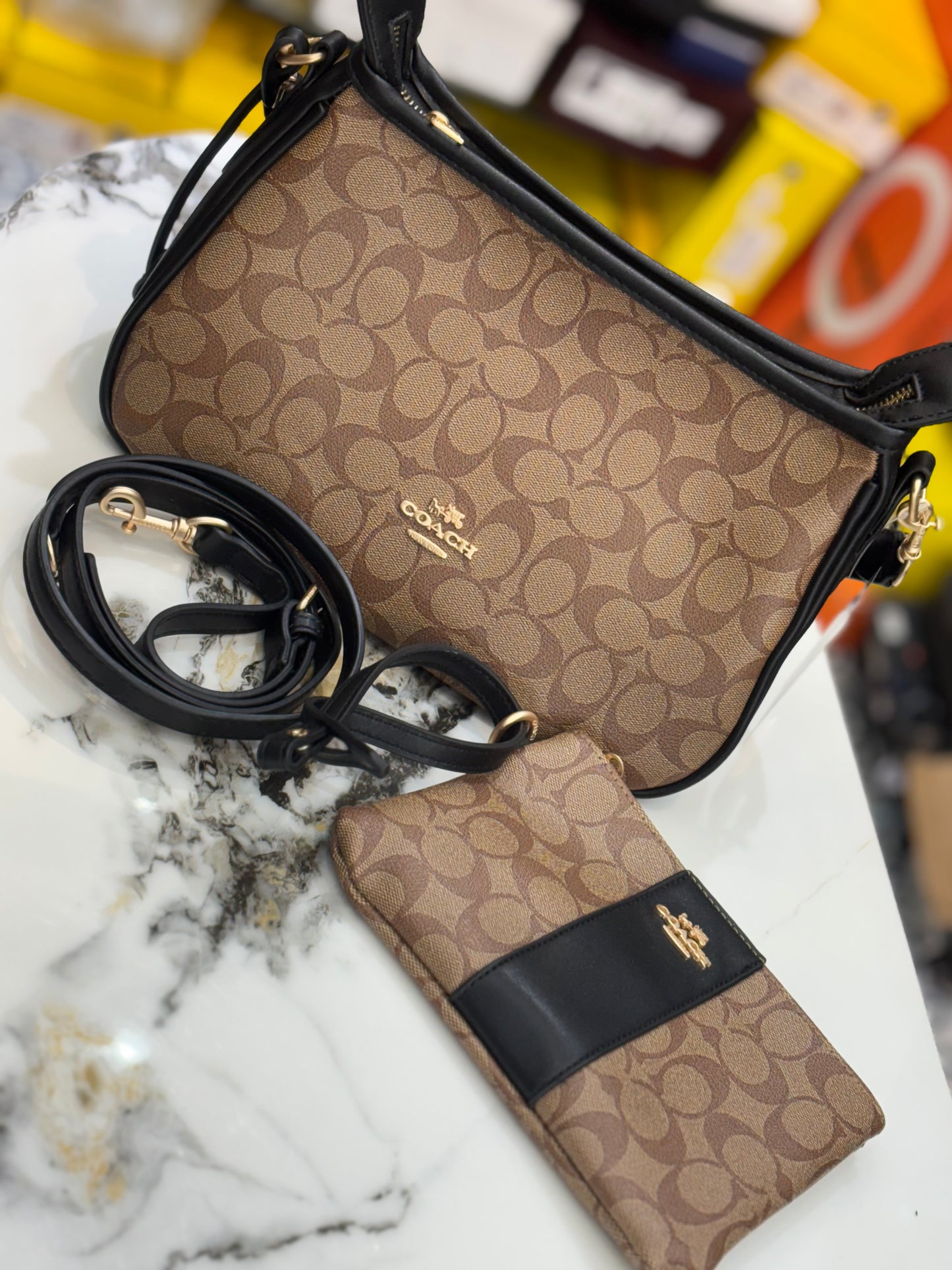 Coach sling with pouch