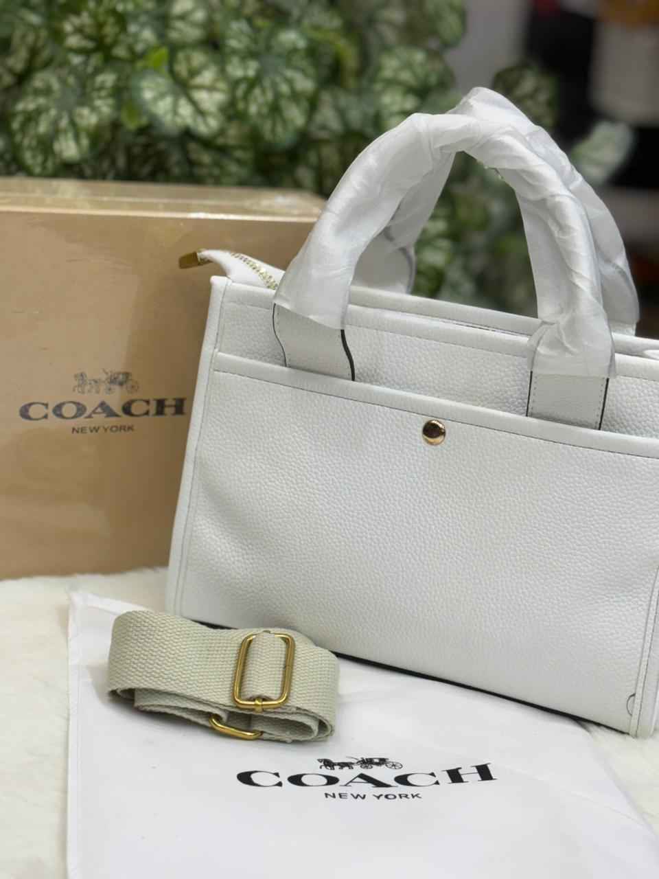 Luxury Coach cargo bag in town for women