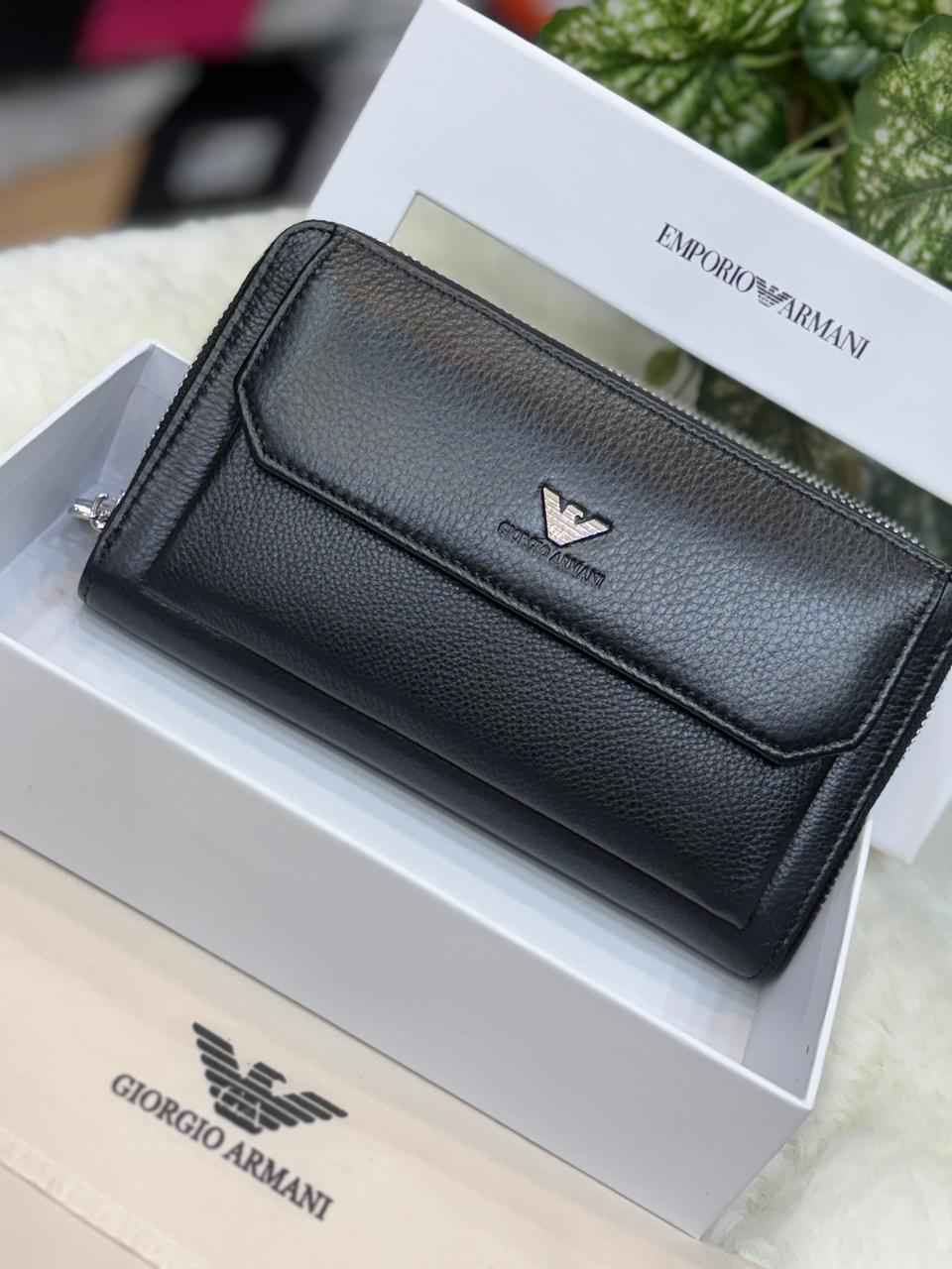 Luxury Armani wallet in genuine leather next to original quality