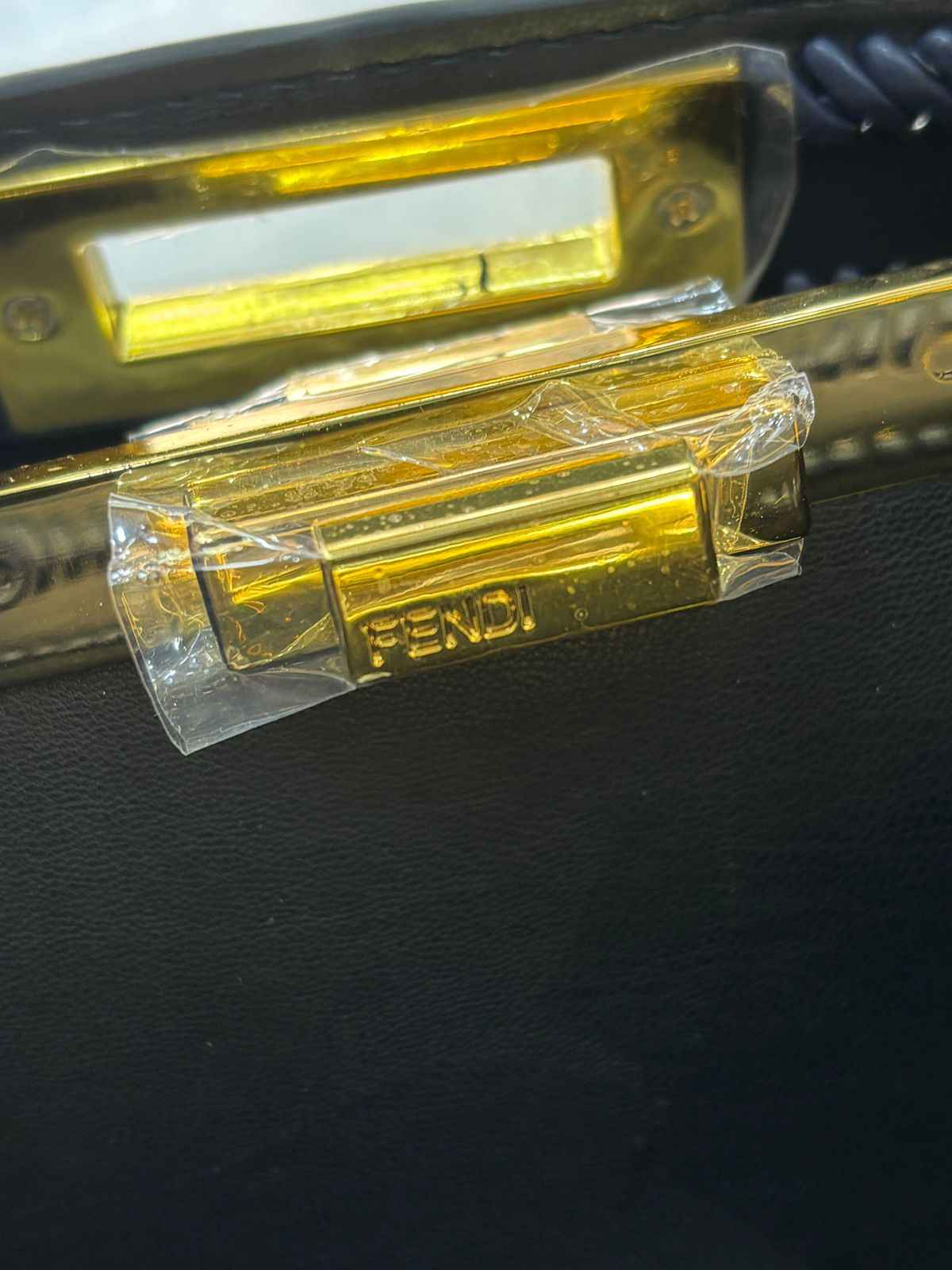 Luxury Fendi peekaboo in genuine leather next to original quality