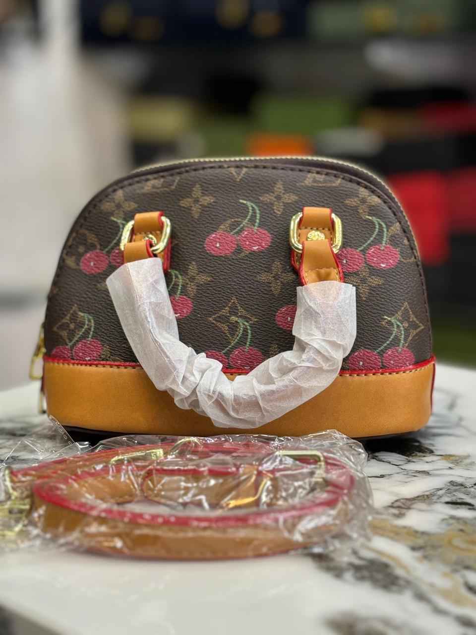 Louis Vuitton lv Alma ( multiple cherries print )