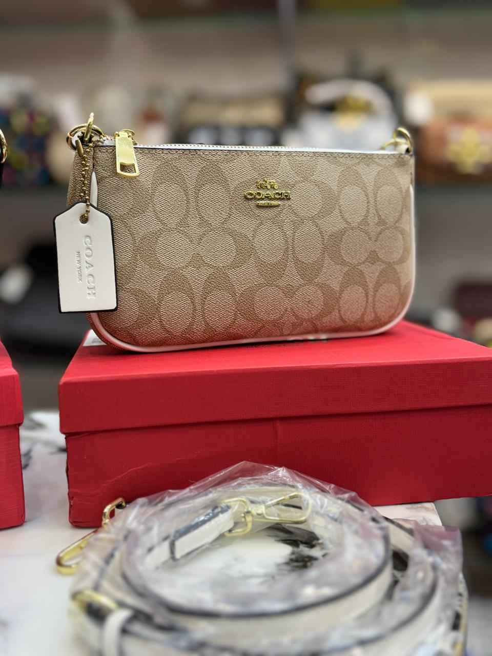 Coach premium sling (c)