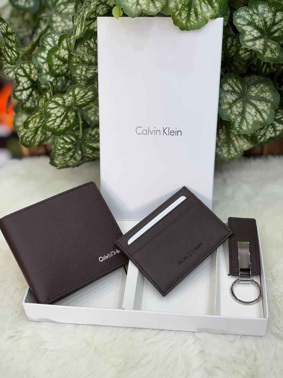 Calvin Klein gift set In genuine leather  ( brown ) includes wallet,card holder and key chain holder next to original quality