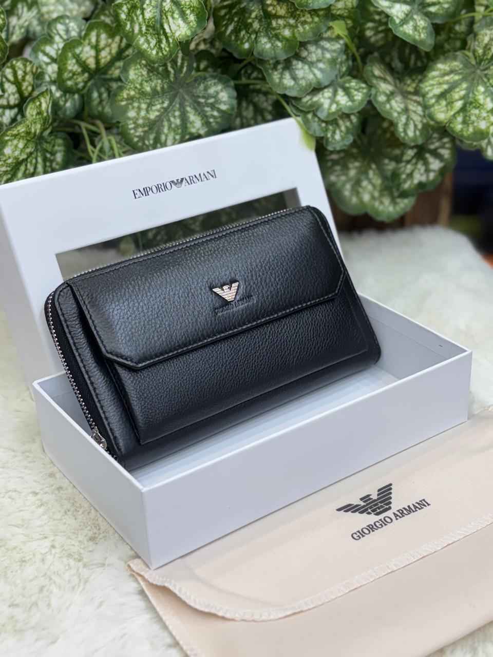 Luxury Armani wallet in genuine leather next to original quality