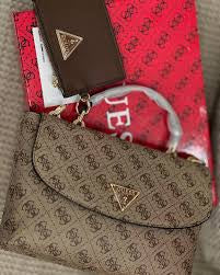 Luxury Guess top handle bag with broad belt and stylish coin pouch