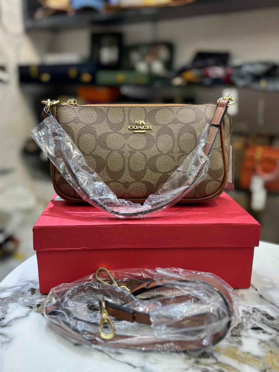 Coach premium sling (c)