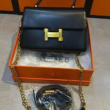 Hermes formal sling bag with top handle
