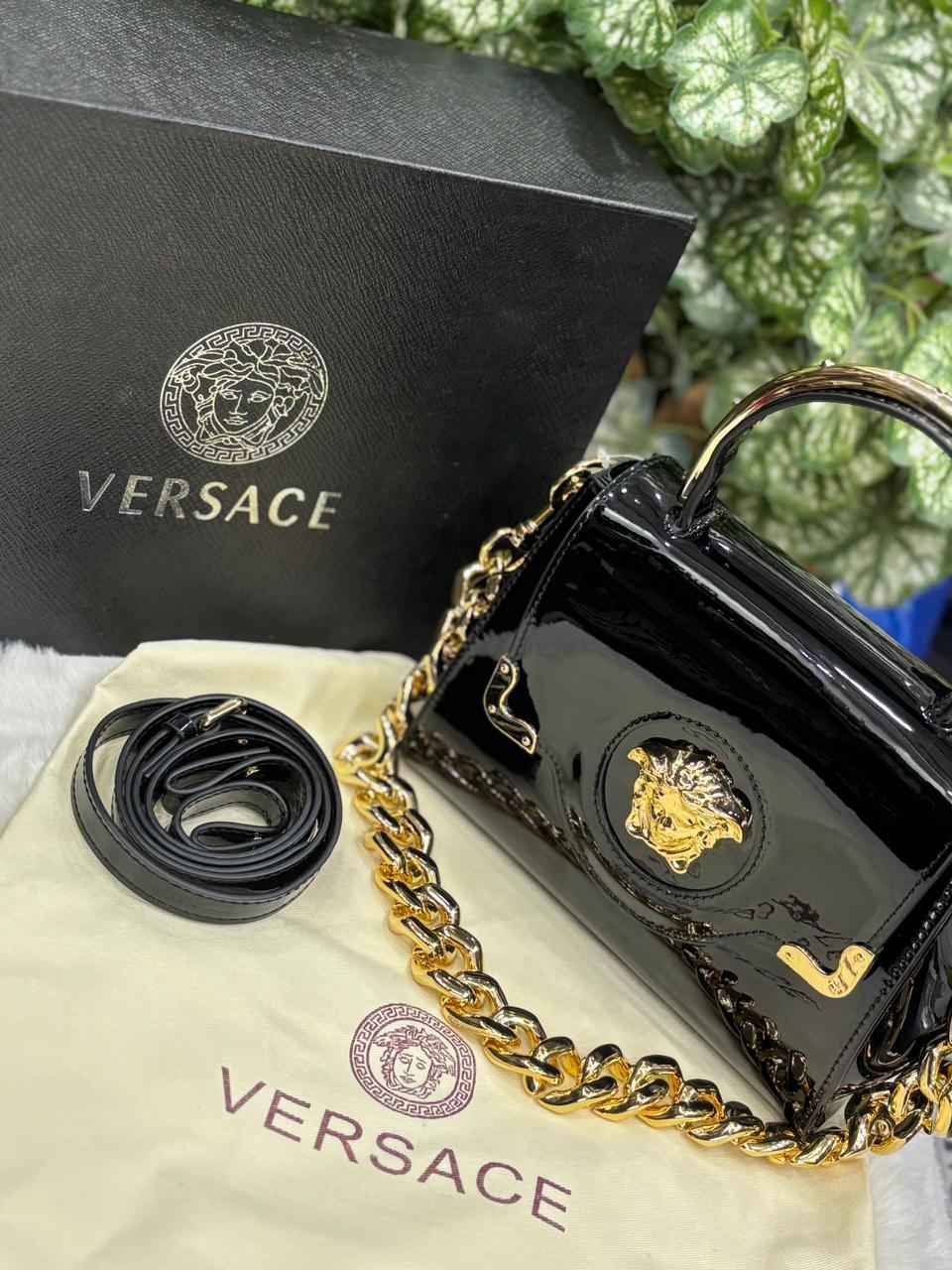 Luxury versace la Medusa bag with top handle