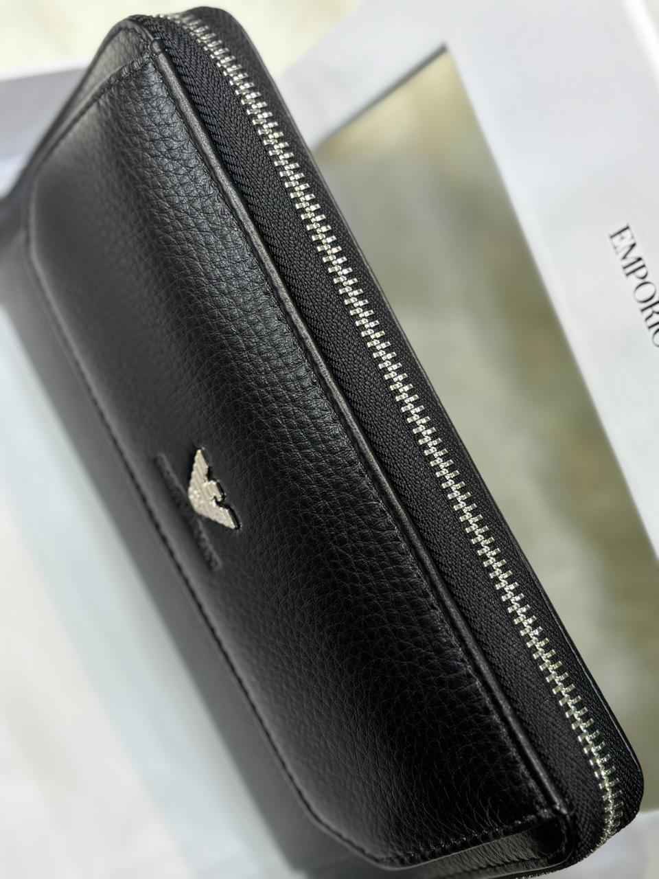 Luxury Armani wallet in genuine leather next to original quality