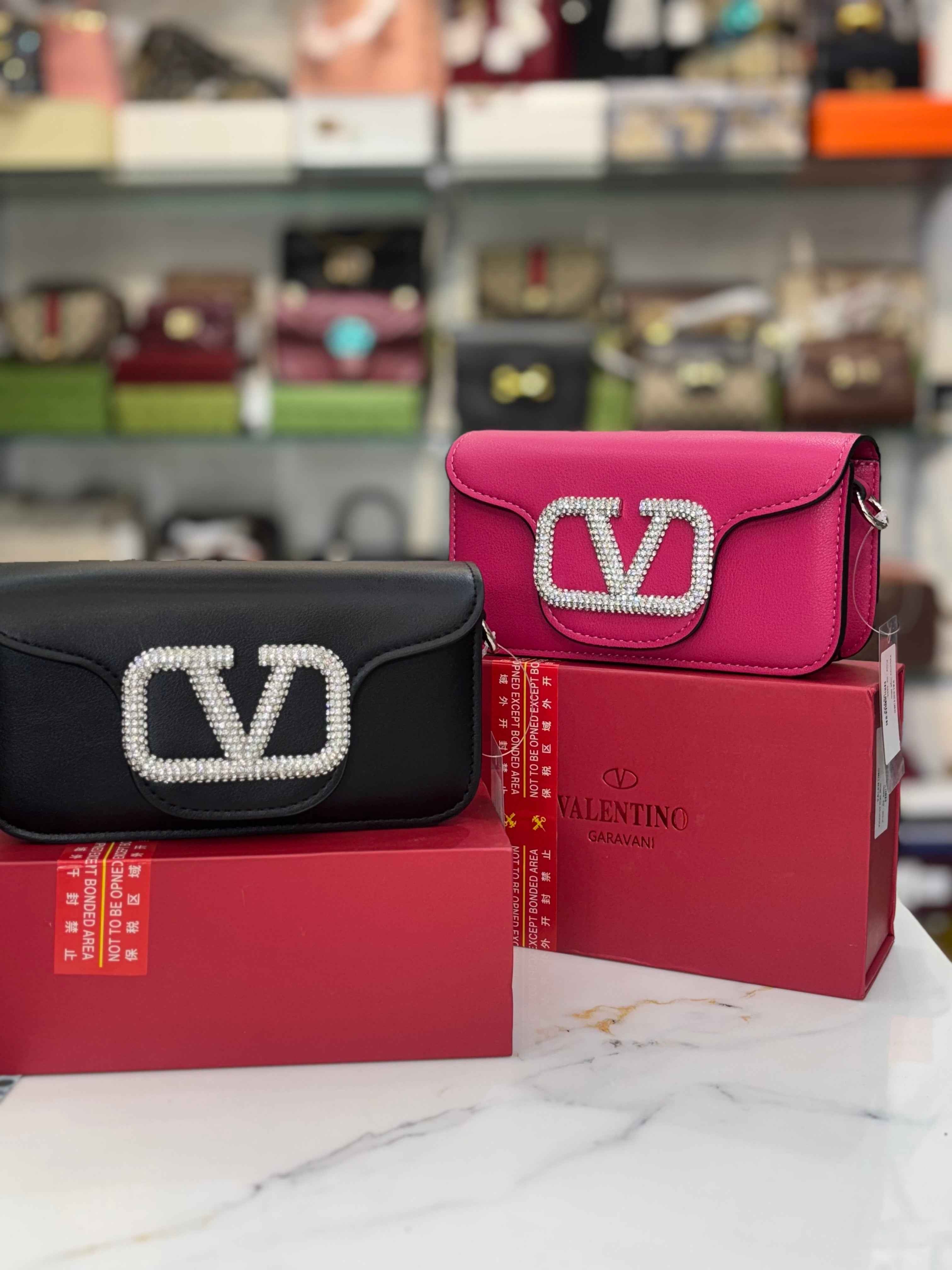 Valentino Garavani v logo shoulder bag