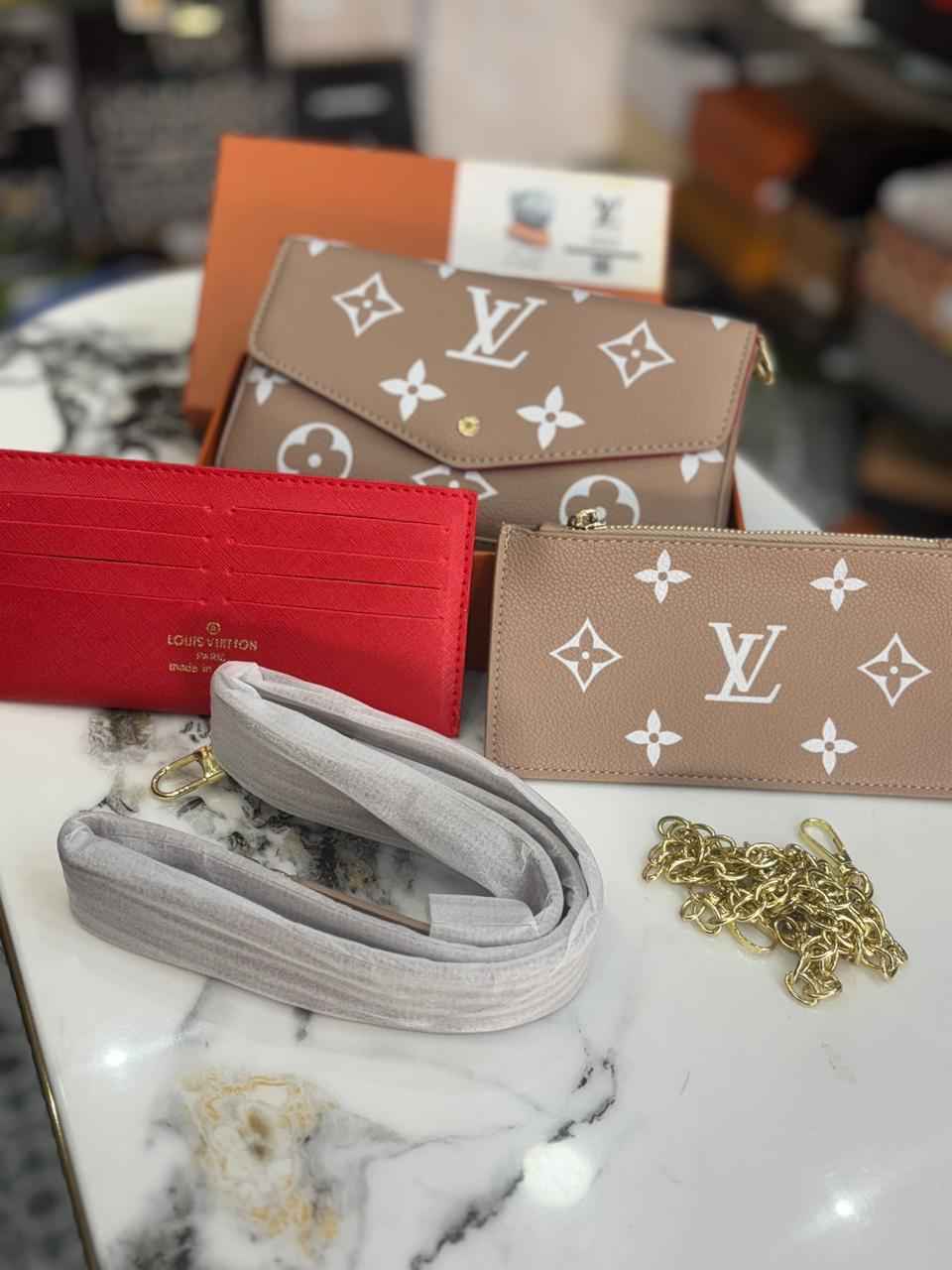 Louis Vuitton (lv) sling (three pcs set )sling ,wallet and card holder with one belt and detachable chain