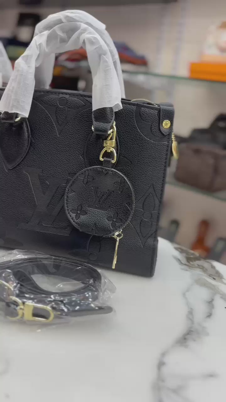 Louis Vuitton (Lv)on the go tote with coin pouch for women