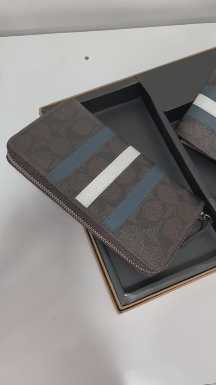Luxury Coach (gift set ) includes one men wallet and one ladies wallet